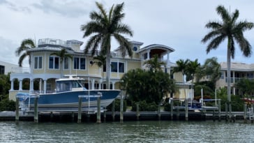 Liking this beauty on Longboat Key for the roof top deck, unique features and the landscaping.